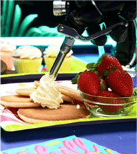 Shake the dispenser, then dispense the whippedcream onto your dessert.